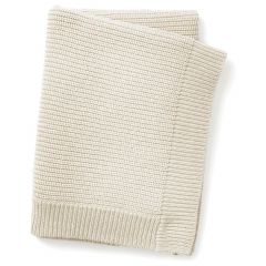 Couverture en laine tricotée